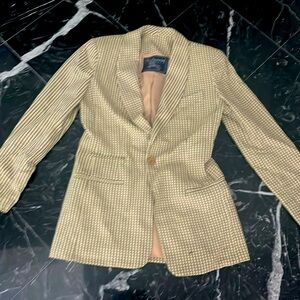 Cream and green Burberry suit jacket.
